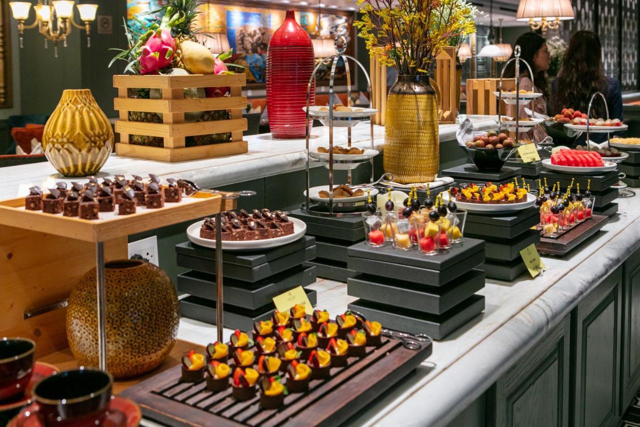 Peridot Grand Luxury Boutique Hotel Ханой Екстер'єр фото A dessert buffet